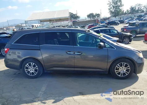 2011 Honda Odyssey Ex-L z USA, uszkodzony, nr VIN 5FNRL5H60BB007930